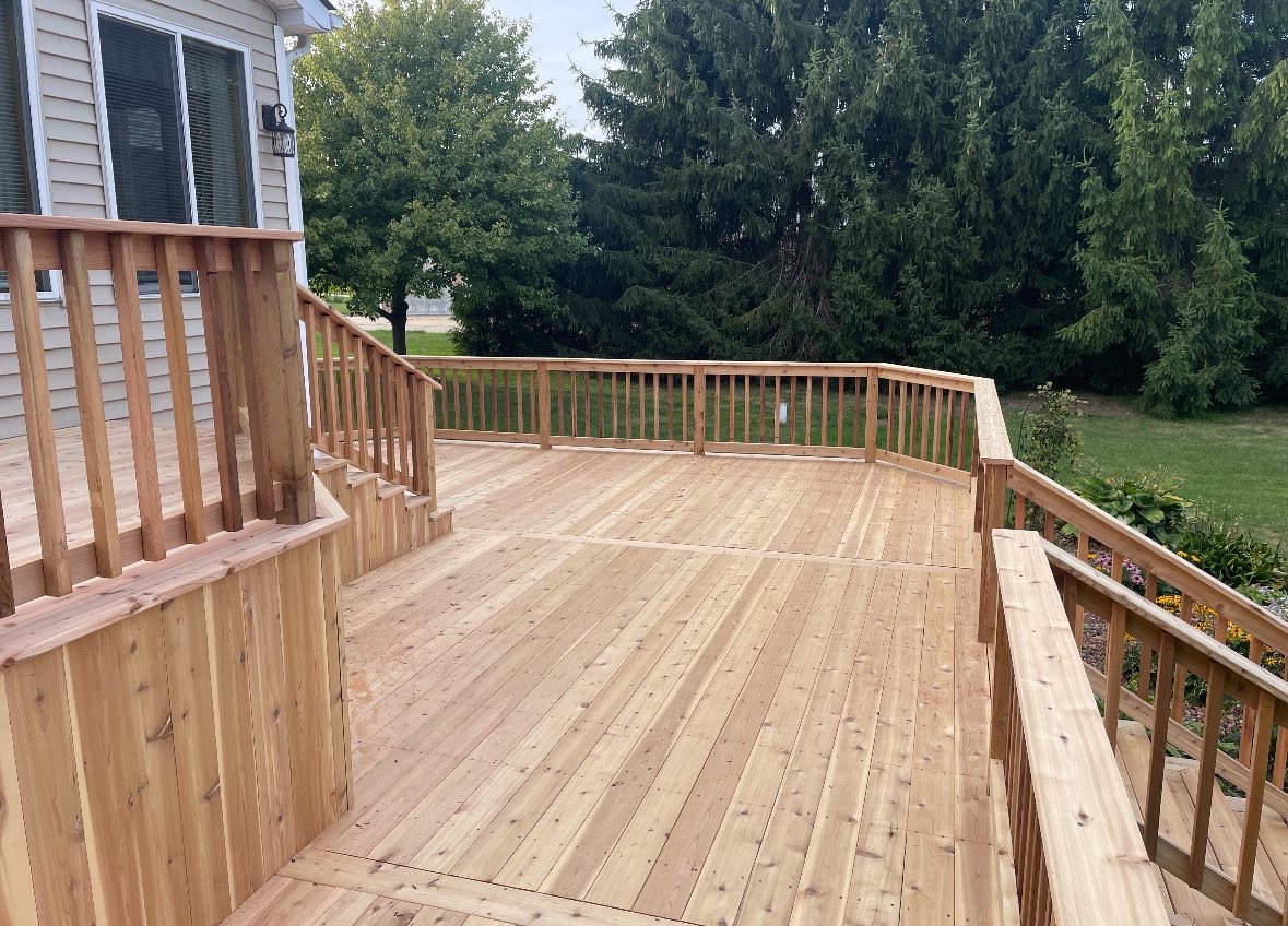 Cedar wraparound deck with built-in bench